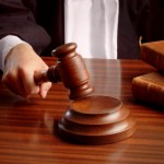 judge hand with gavel